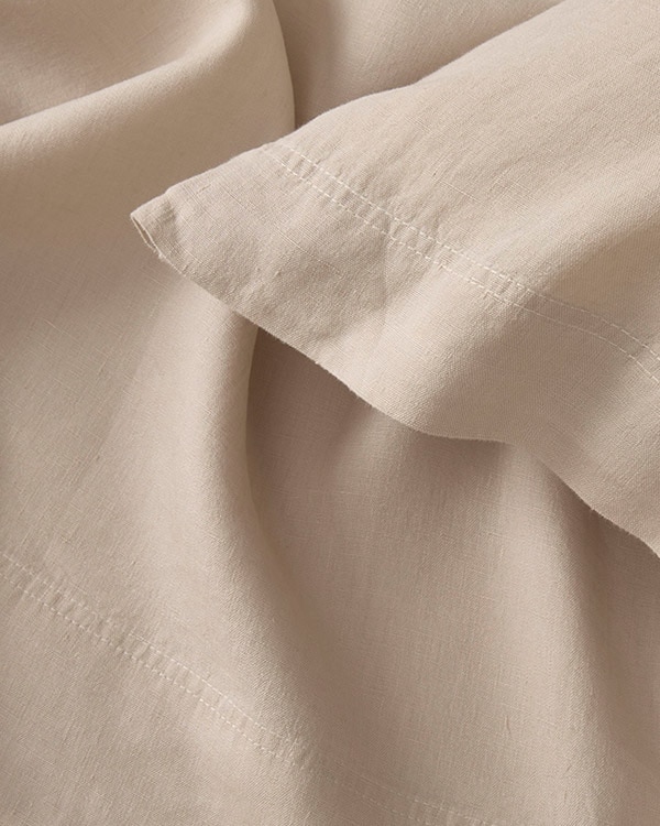 Close-up image of the hemline on the Relaxed-Linen Sheets.