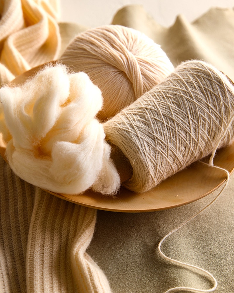 Cashmere fibers up close. Learn more about cashmere.